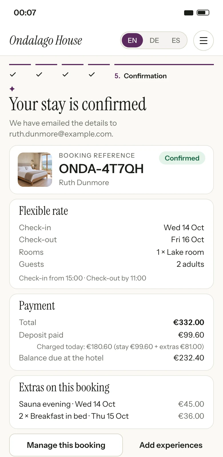 The booking engine's confirmation page on a phone, with the booking reference, stay dates and room, what was paid online, the balance still due at the hotel, the extras bought and a link to manage the booking. Illustration with sample data.